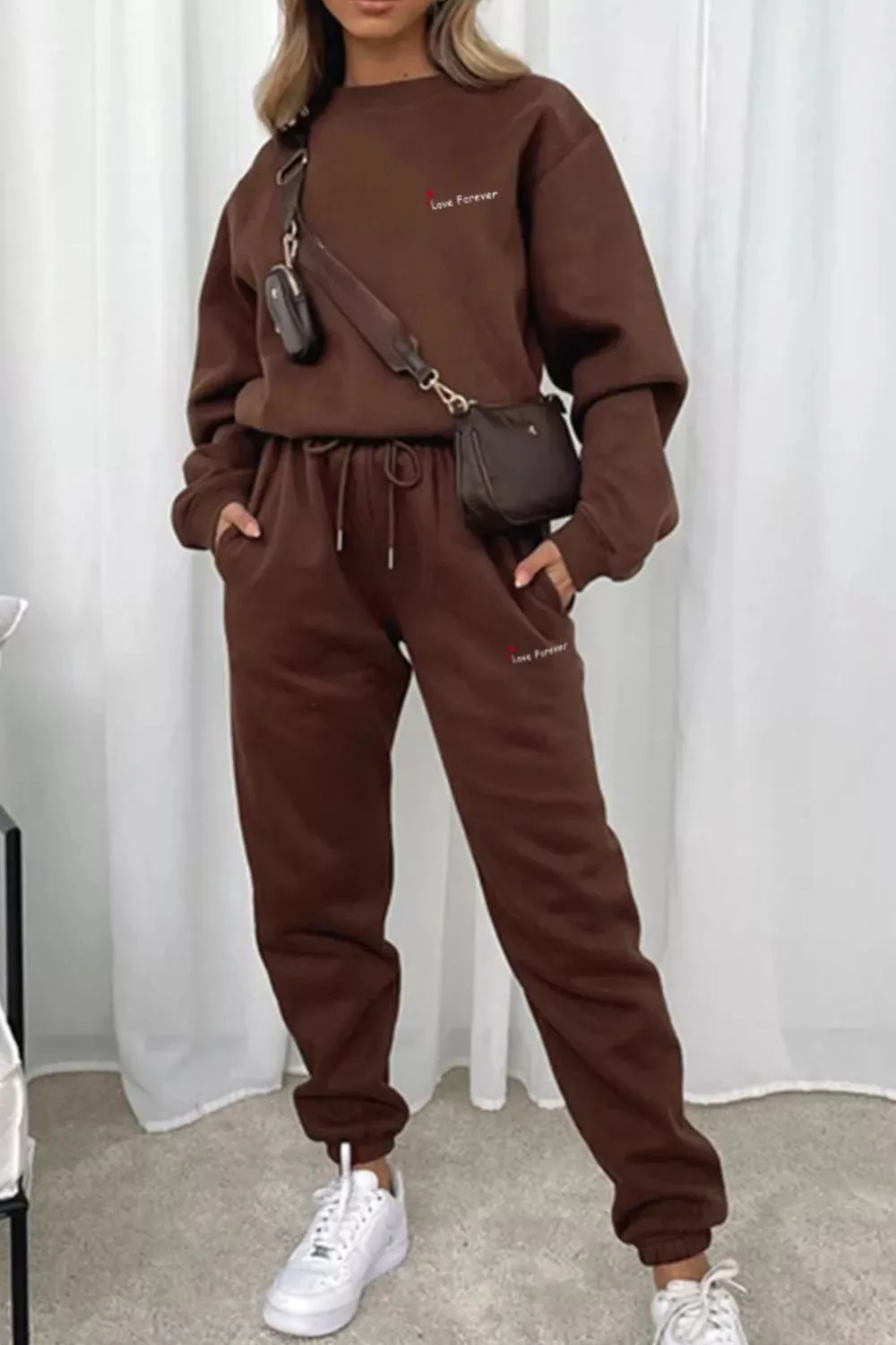 Round Neck Sweatshirt and Joggers Set sold by Charming Charlie