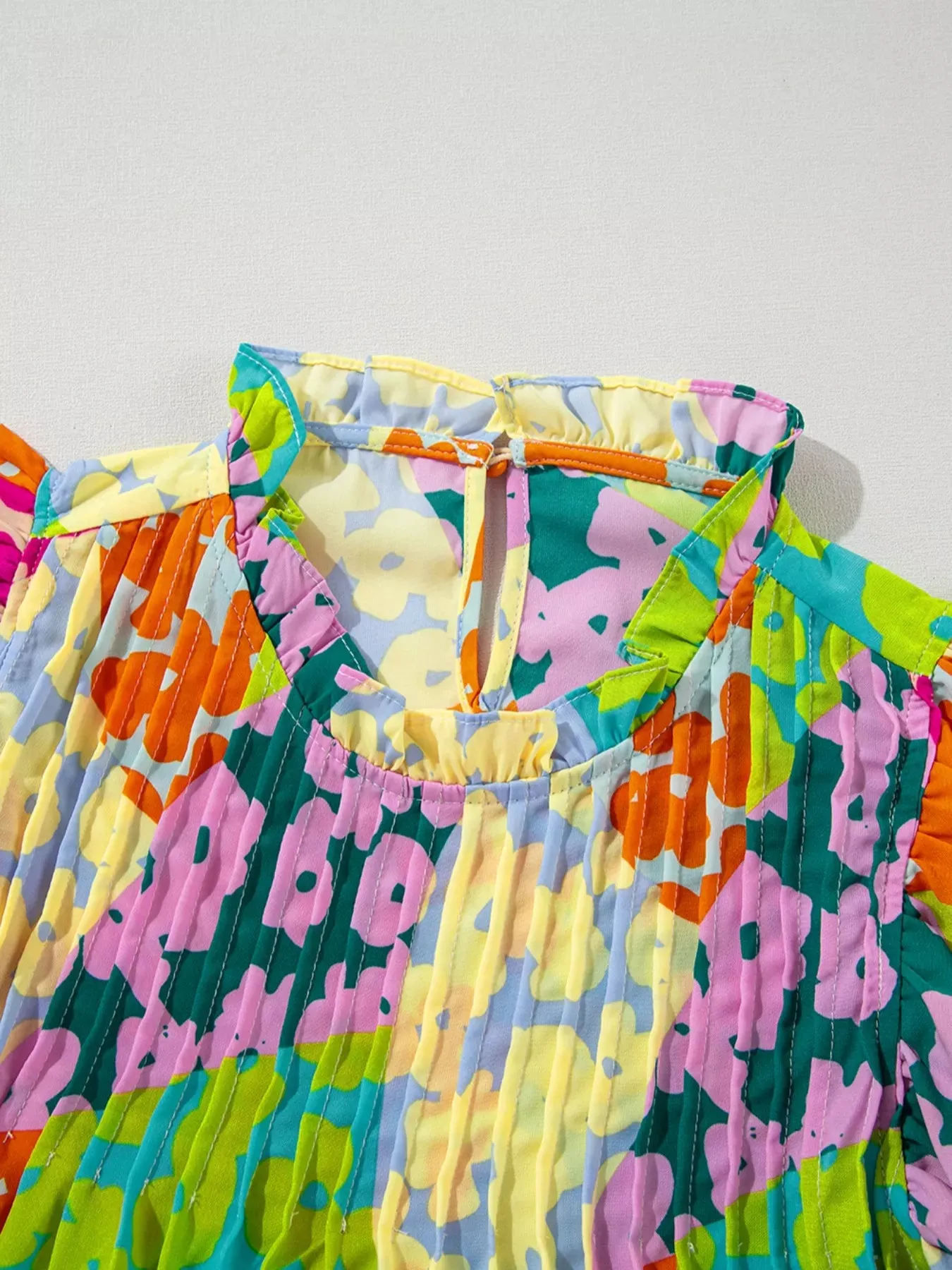 Printed Ruffled Cap Sleeve Blouse sold by Charming Charlie product image thumbnail 4