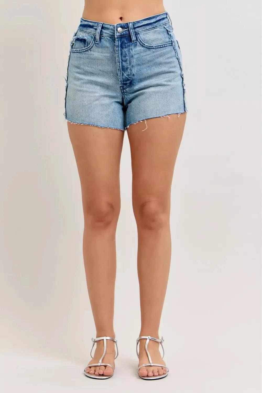 Judy Blue Hw Rigid Magic Cut Off Denim Shorts with Raw Side Seams sold by Charming Charlie