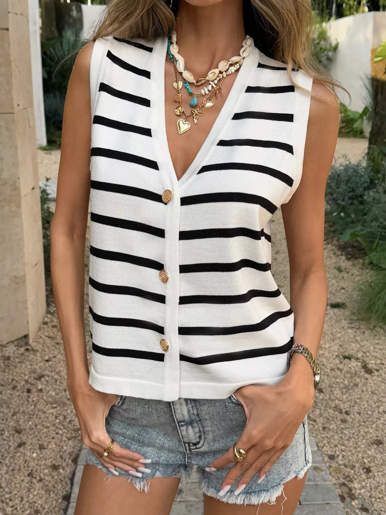 Striped Button-Down Sleeveless Cardigan sold by Charming Charlie