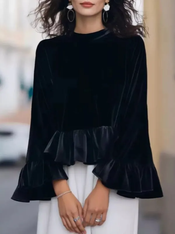 Velvet Ruffle Hem Blouse sold by Charming Charlie
