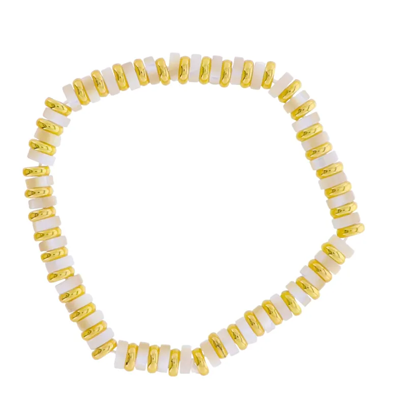 18k Gold Plated White Shell Beaded Stretch Bracelet with Gold Spacers sold by Charming Charlie