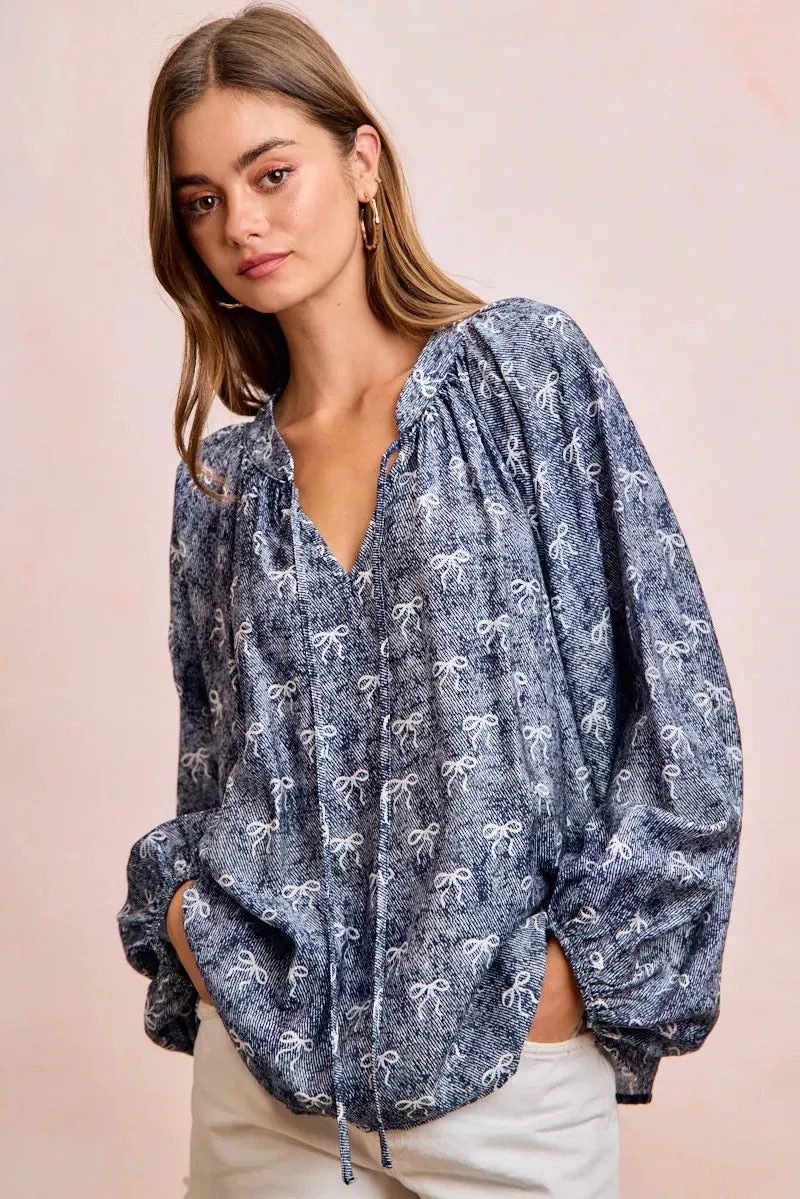 BiBi Ribbon Bow Print Exaggerated Balloon Sleeves Top sold by Charming Charlie product image thumbnail 2