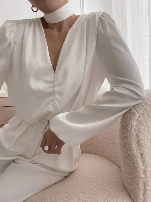 V-Neck Ruched Long Sleeve Blouse sold by Charming Charlie