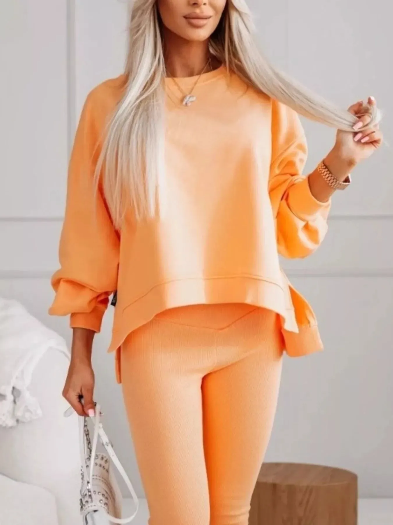 Side Slit Solid Color Oversized Sweatshirt sold by Charming Charlie