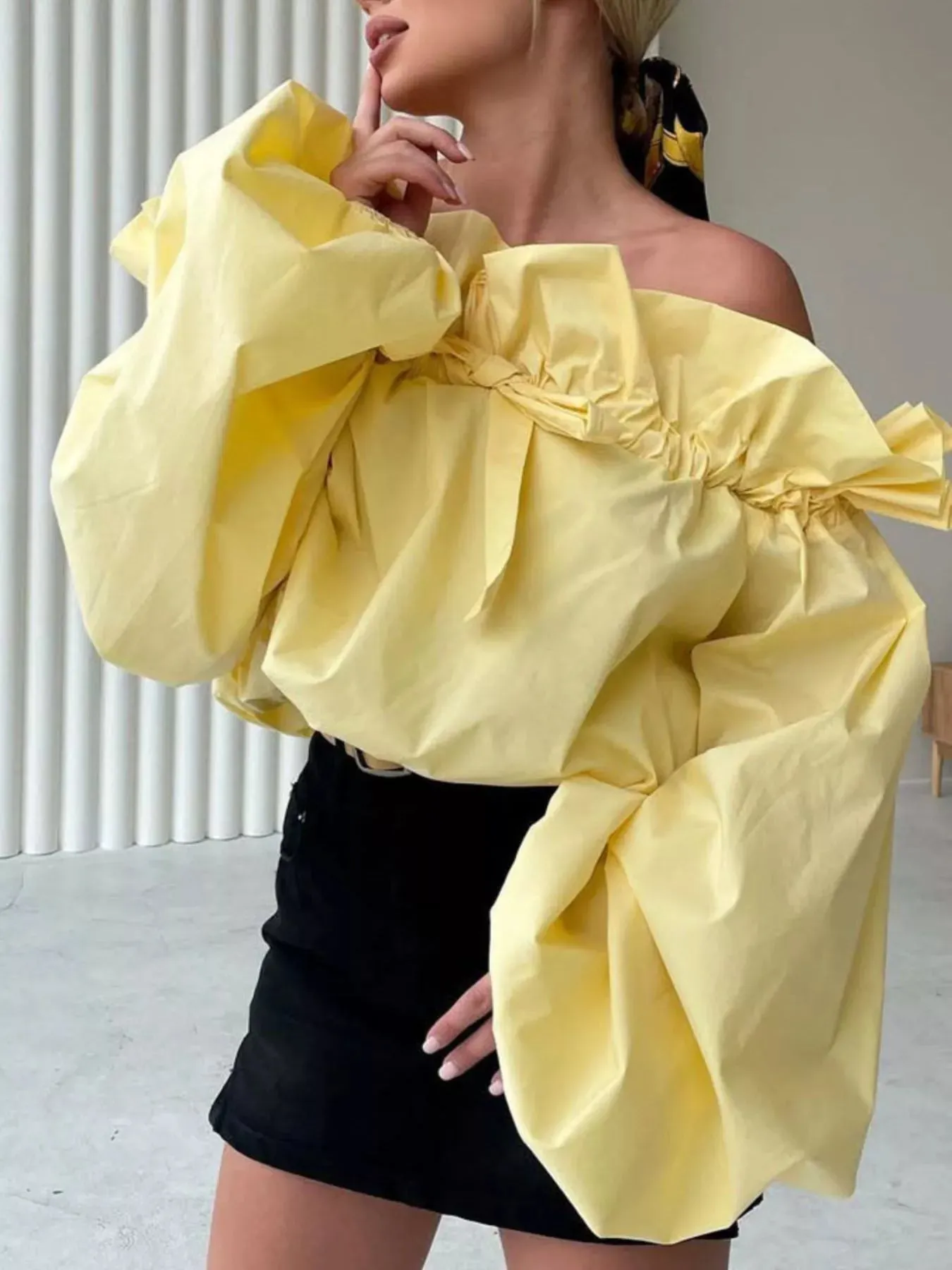 Off-Shoulder Ruffled Balloon Sleeve Blouse sold by Charming Charlie