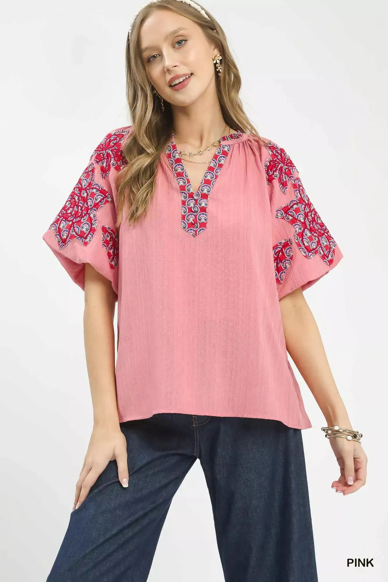 Umgee Embroidered Sleeve Contrast Trim Top sold by Charming Charlie