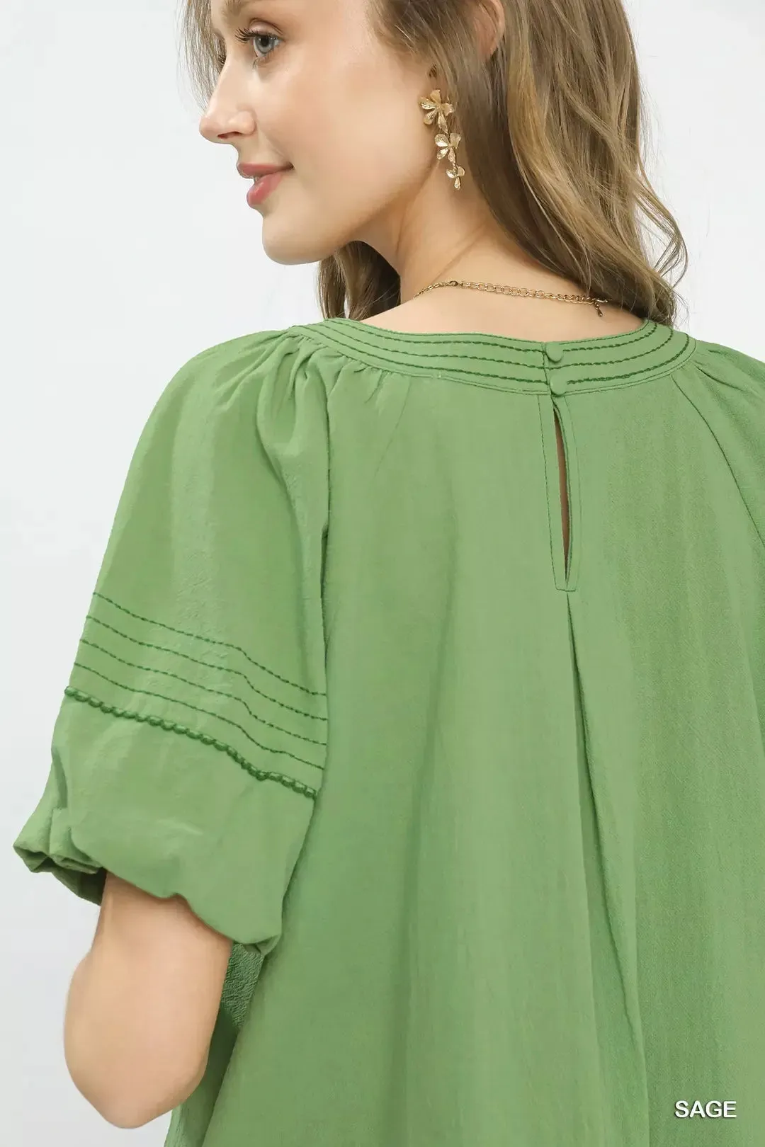 Umgee Round Neck Puff Sleeve Top with Contrast Stitch Detail sold by Charming Charlie product image thumbnail 4
