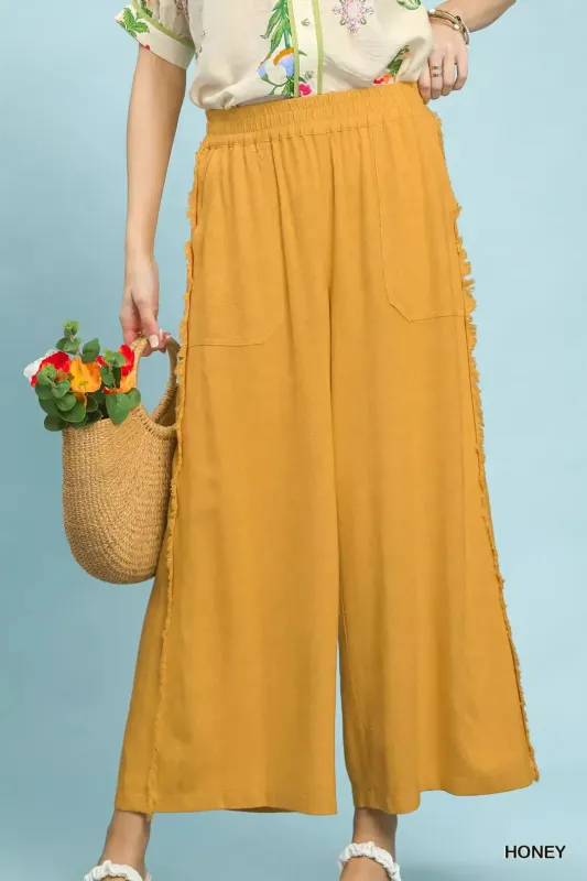 Umgee Linen Frayed Side Pocket Wide Leg Pants sold by Charming Charlie