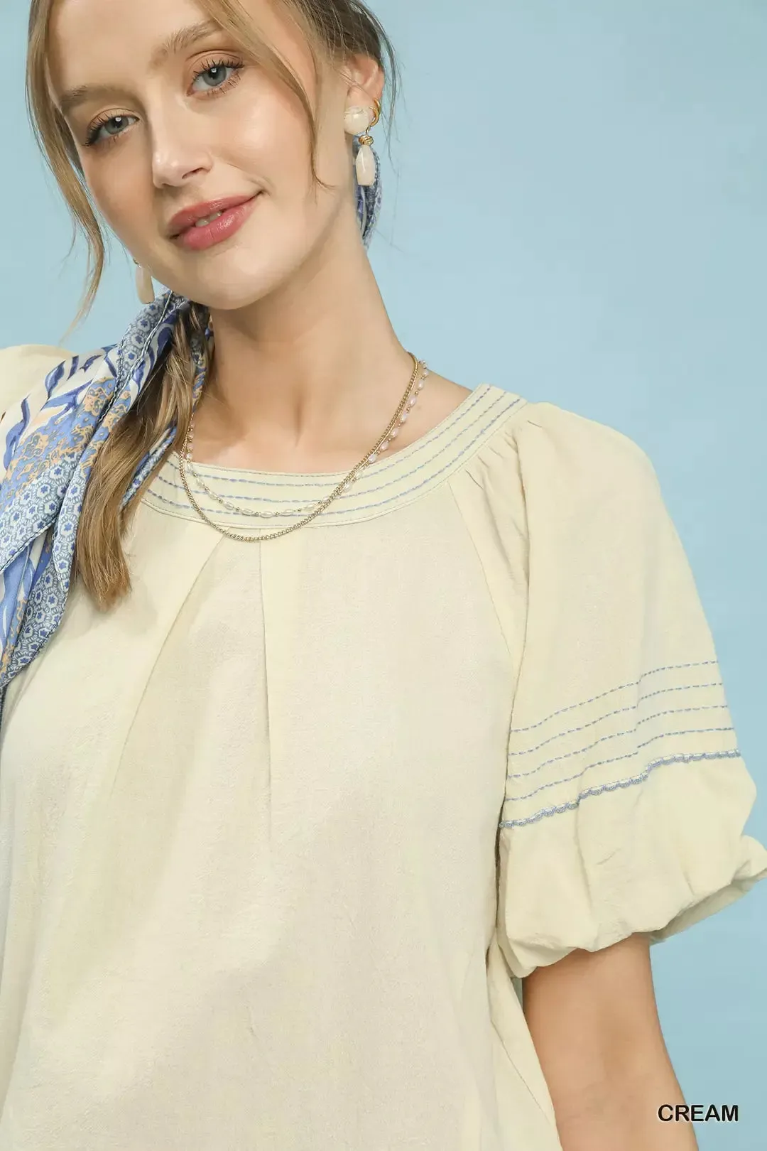 Umgee Round Neck Puff Sleeve Top with Contrast Stitch Detail sold by Charming Charlie product image thumbnail 4