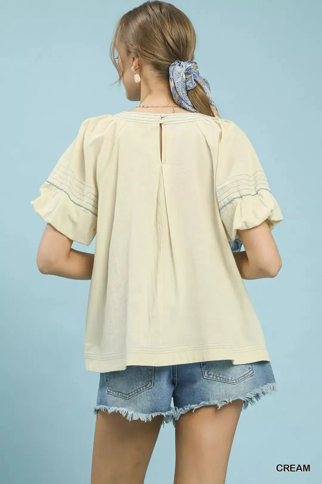 Umgee Round Neck Puff Sleeve Top with Contrast Stitch Detail sold by Charming Charlie product image thumbnail 3