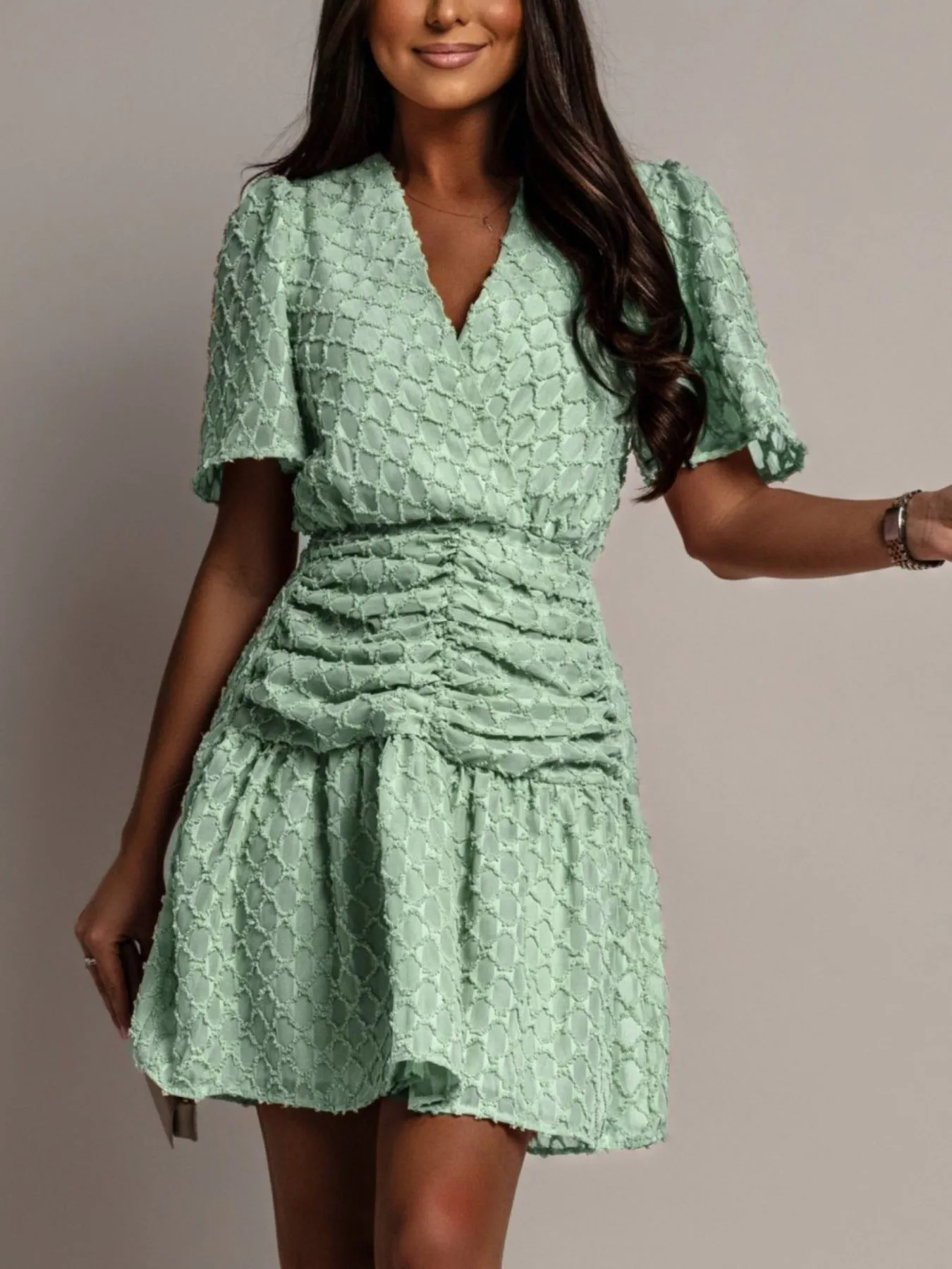 Textured Ruched Surplice Short Sleeve Dress sold by Charming Charlie product image thumbnail 5