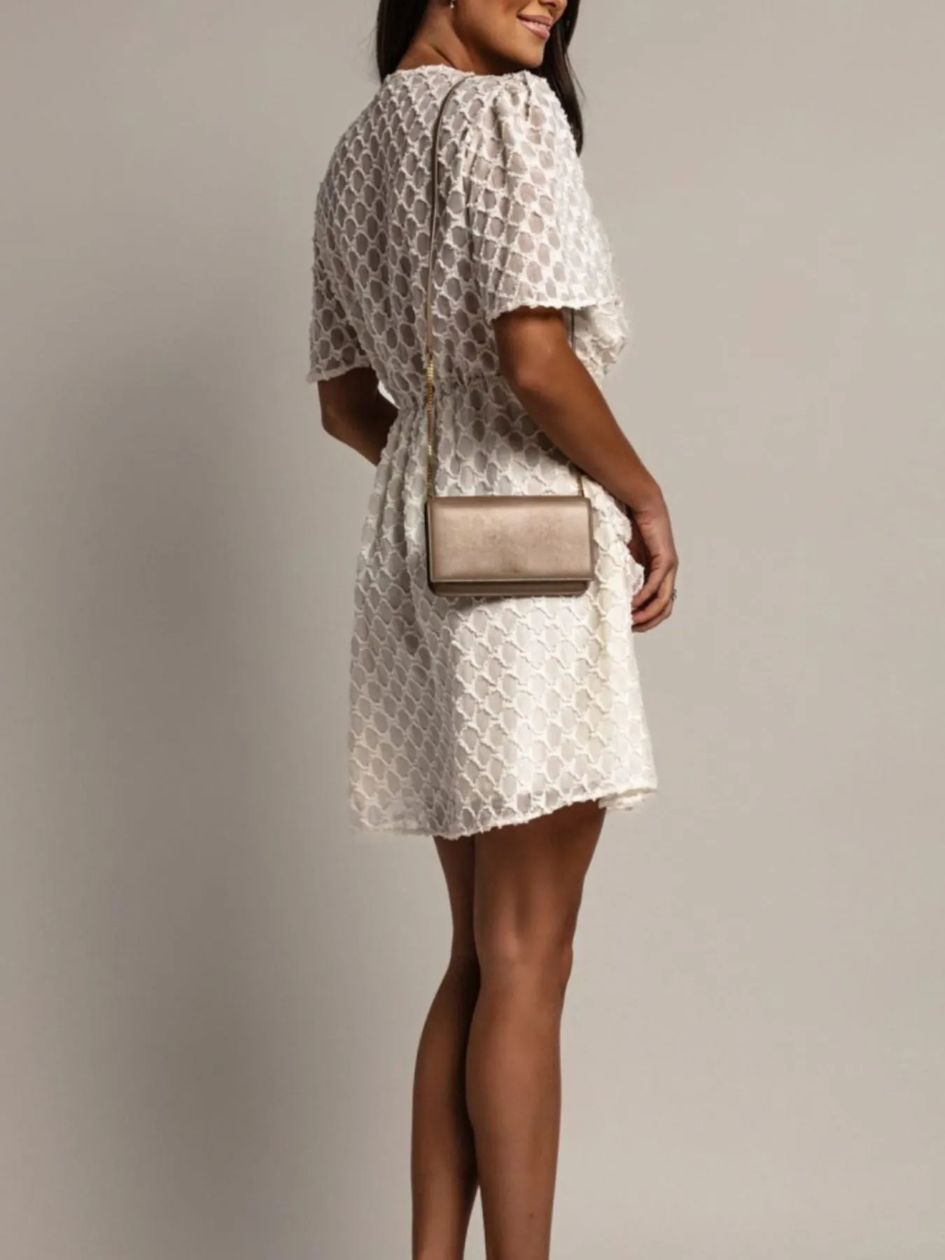 Textured Ruched Surplice Short Sleeve Dress sold by Charming Charlie product image thumbnail 4