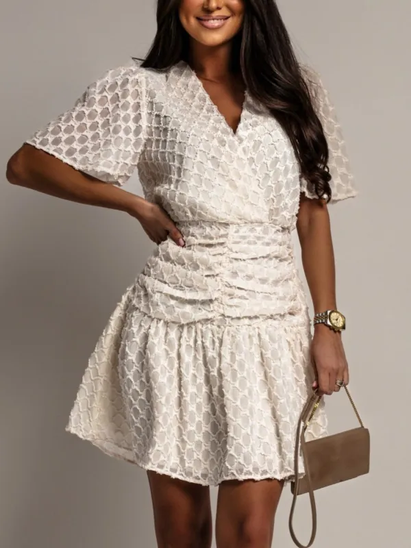Textured Ruched Surplice Short Sleeve Dress made by Trendsi