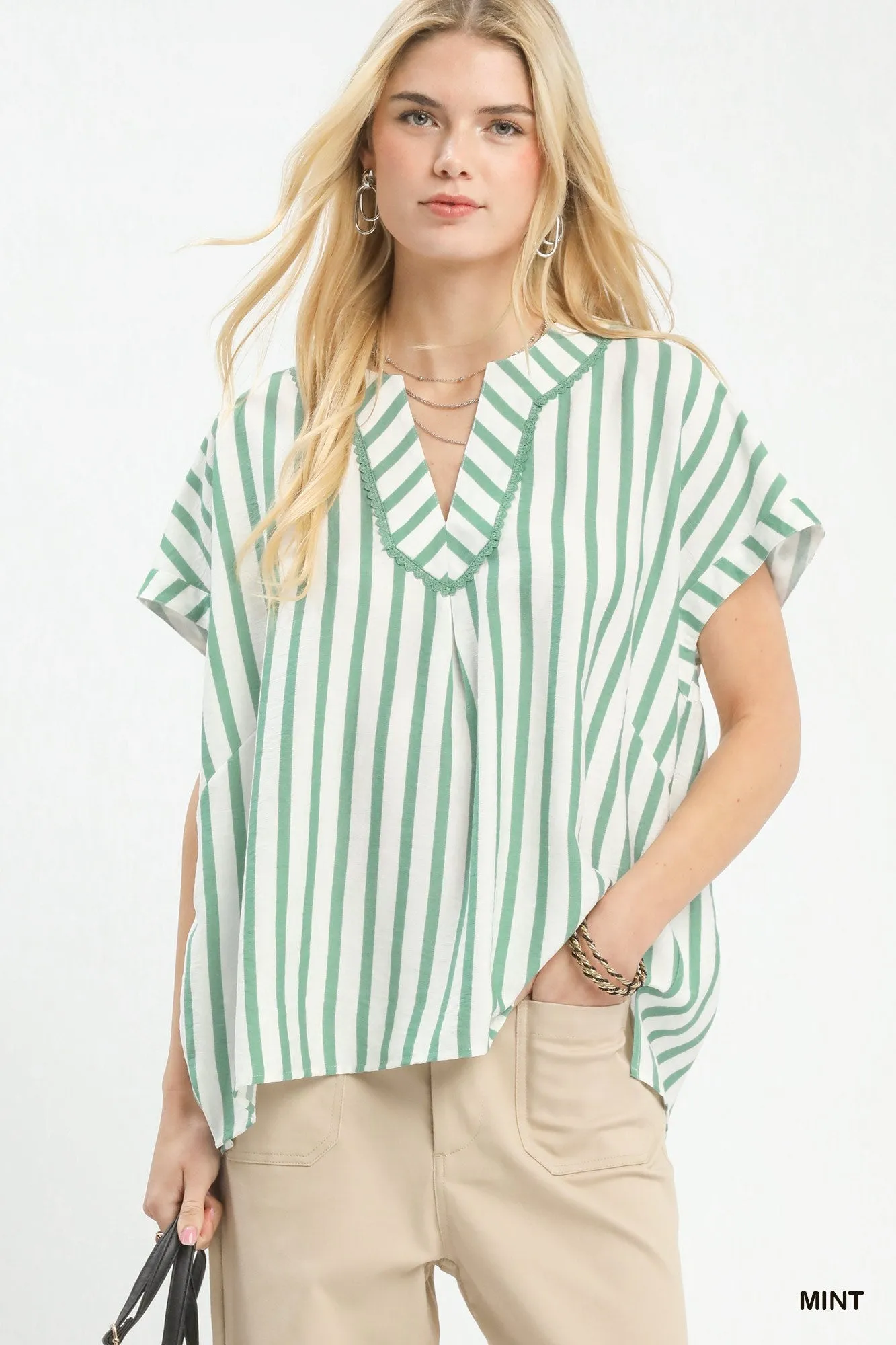 Umgee Mixed Stripe Split Neck Oversized Blouse sold by Charming Charlie
