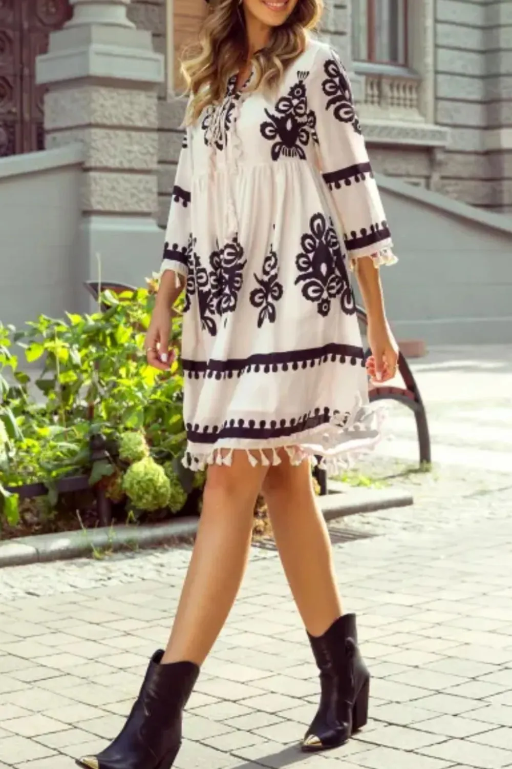 Tassel Hem 3/4 Sleeve Mini Dress sold by Charming Charlie product image thumbnail 4