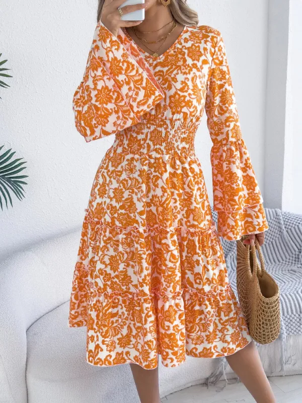 Floral Print Smocked Ruffle Hem Flared Sleeve Dress sold by Charming Charlie