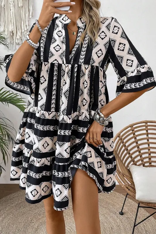 Geometric Print Ruffle Hem Mini Dress sold by Charming Charlie