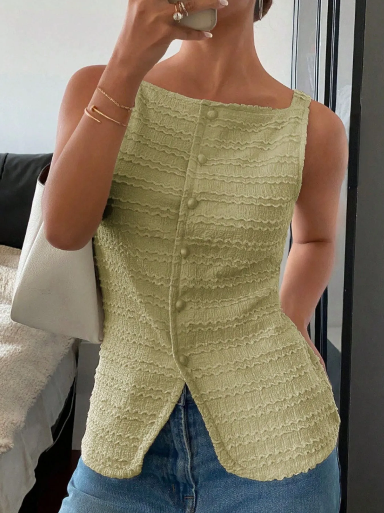 Textured Button-Front Tank sold by Charming Charlie