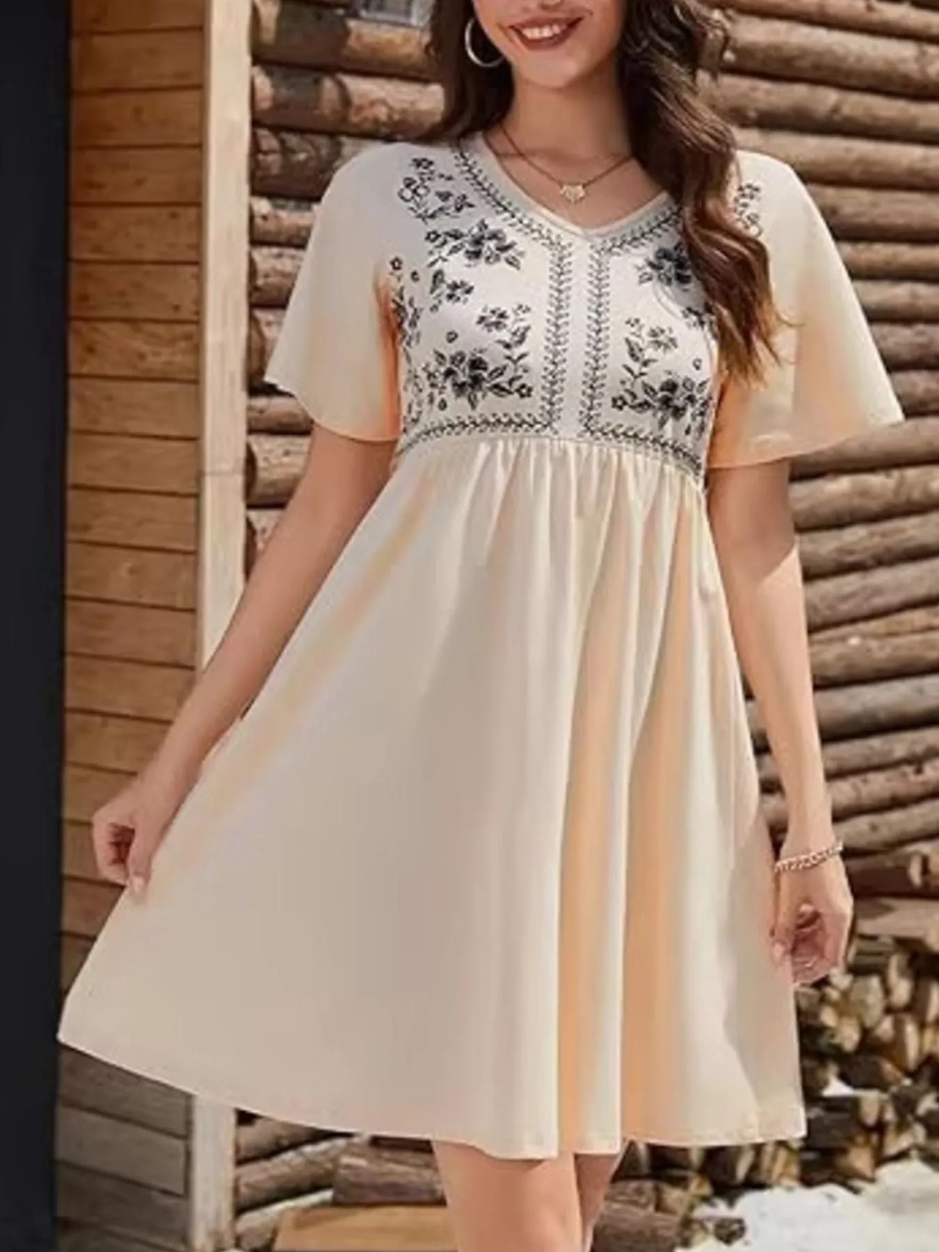 Floral Short Sleeve Flowy Mini Dress sold by Charming Charlie