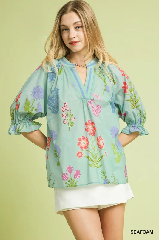 Umgee Floral Split Neck Puff Sleeve Top sold by Charming Charlie