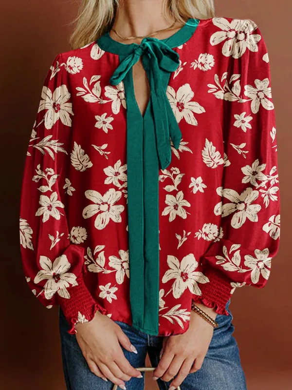 Contrast Tied Neck Shirred Puff Sleeve Flower Blouse sold by Charming Charlie