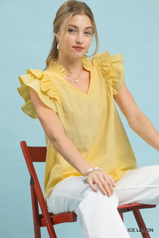 Umgee Textured Ruffle Sleeve V-Neck Blouse sold by Charming Charlie