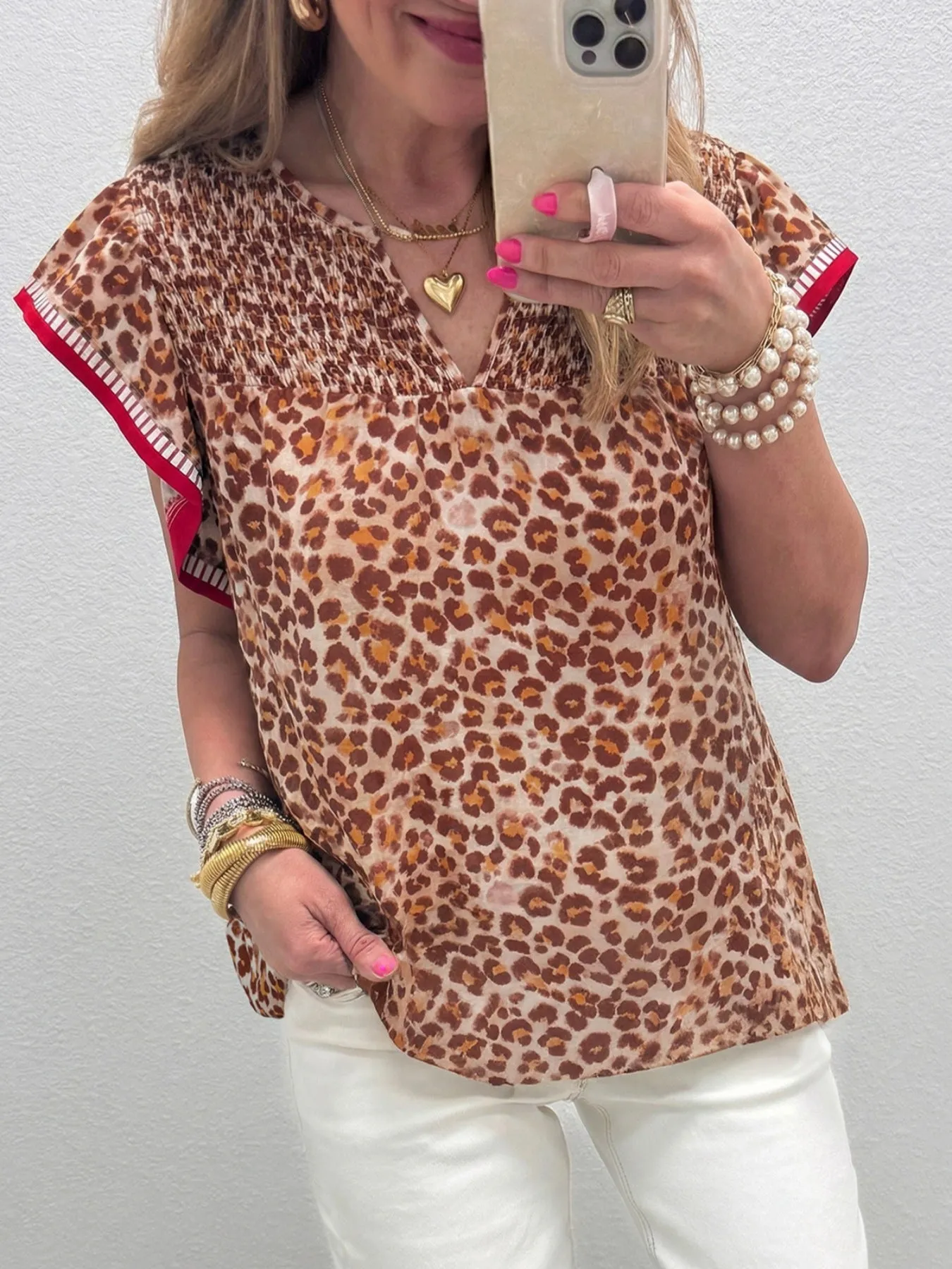Leopard Print Smocked Notched Blouse sold by Charming Charlie product image thumbnail 2