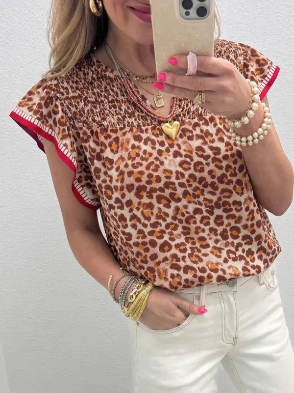 Leopard Print Smocked Notched Blouse made by Trendsi