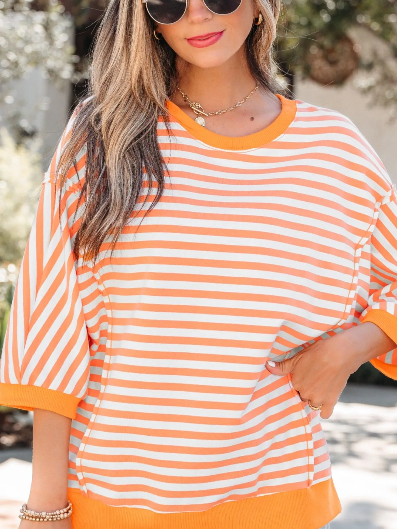 Stripe 3/4 Sleeve Exposed Seam Patchwork Pullover Top sold by Charming Charlie product image thumbnail 4