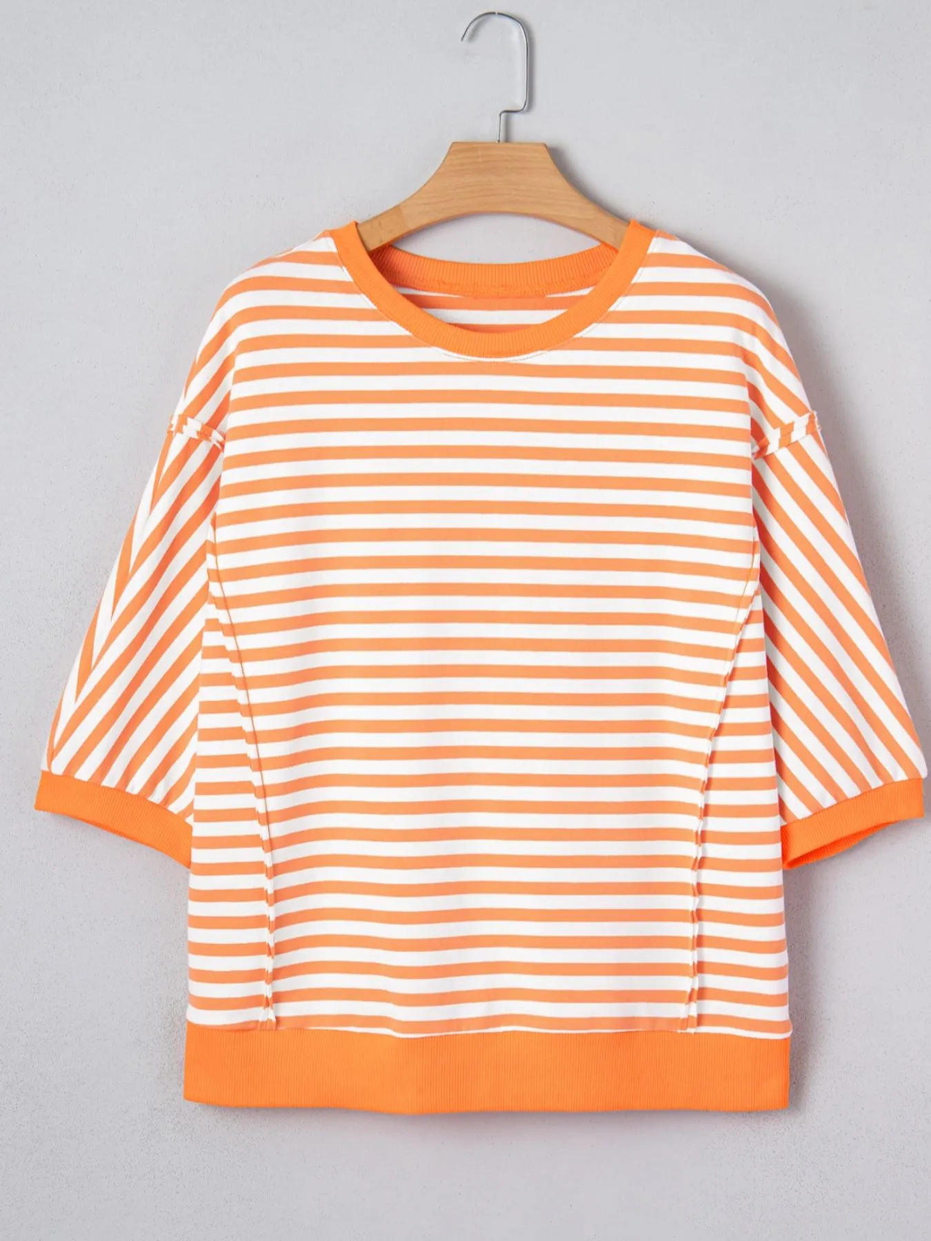 Stripe 3/4 Sleeve Exposed Seam Patchwork Pullover Top sold by Charming Charlie product image thumbnail 5