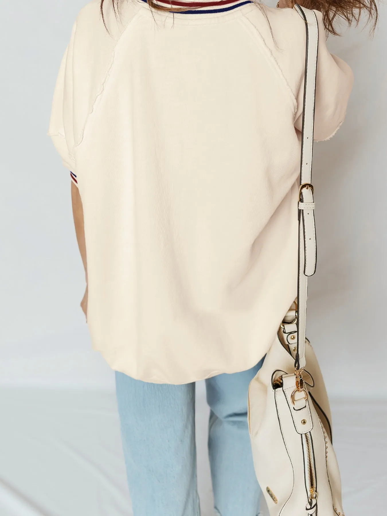 Contrast Varsity Striped Neckline Cuffed Short Sleeve Loose Tunic Top sold by Charming Charlie product image thumbnail 3