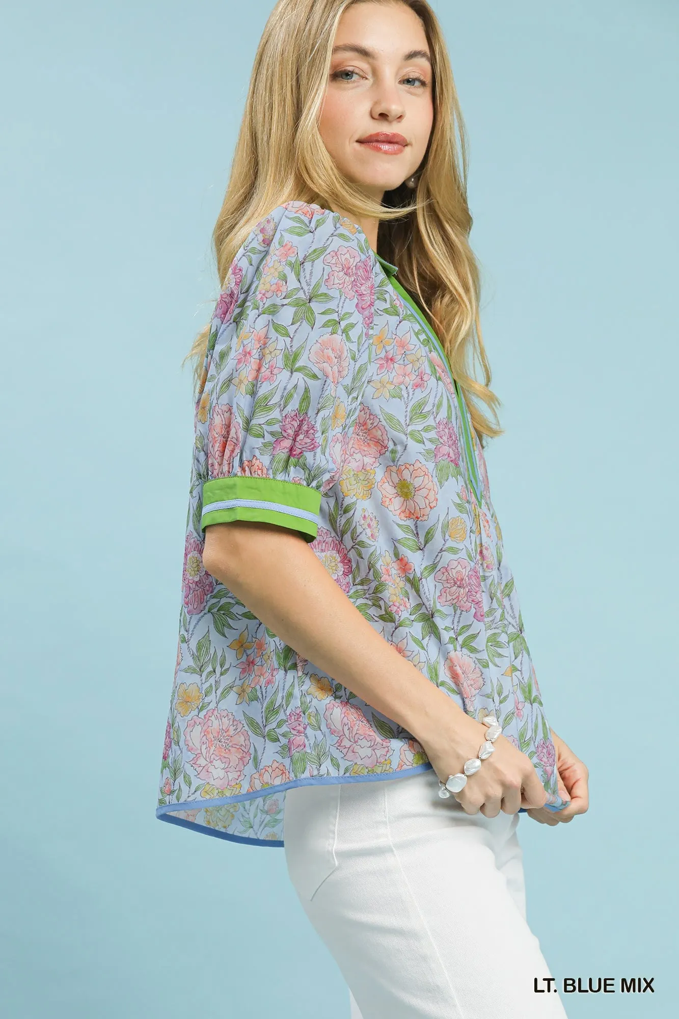 Umgee Mix Floral Puff Sleeve Blouse with Contrast Trim sold by Charming Charlie product image thumbnail 4