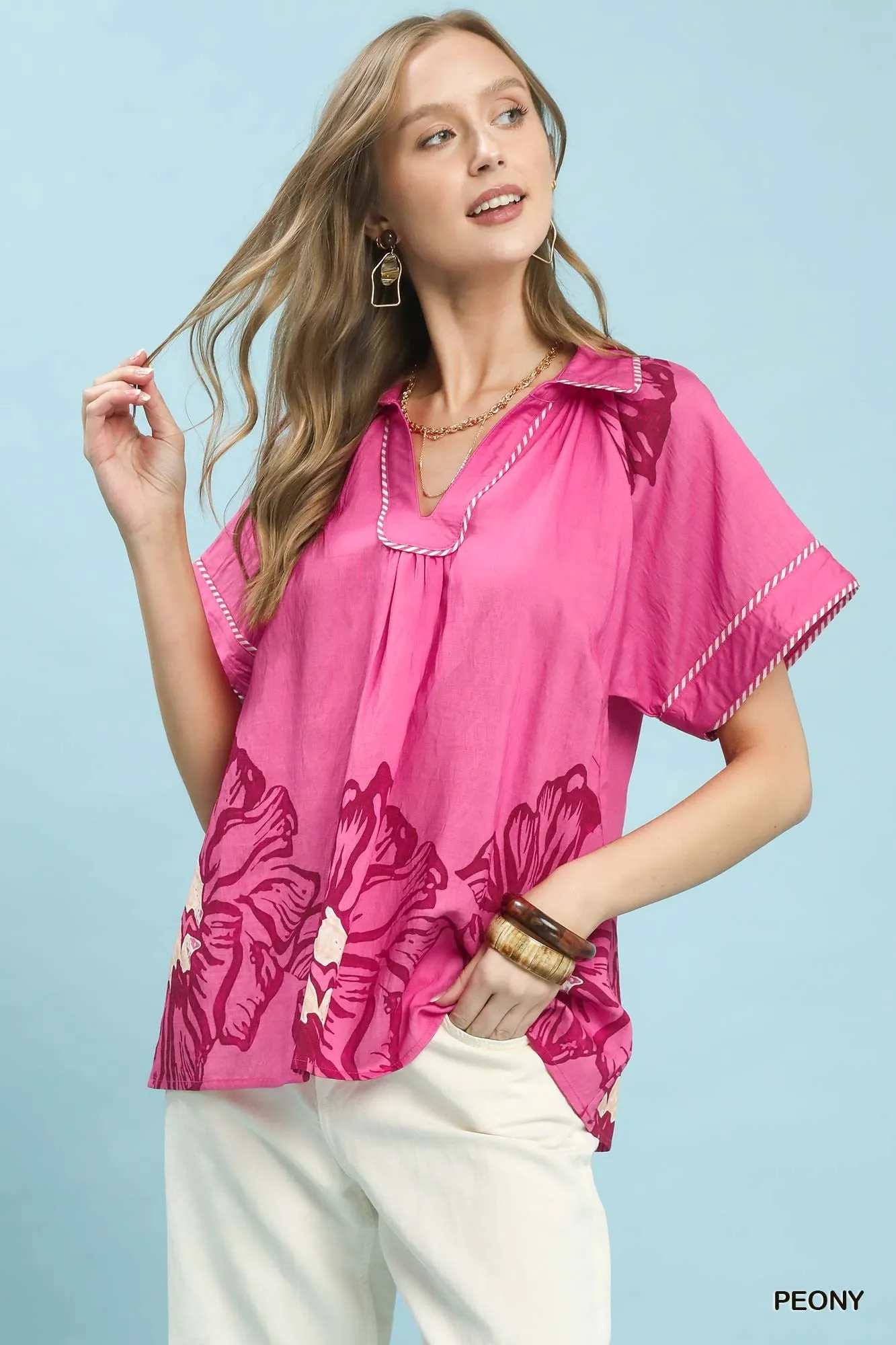 Umgee Floral Split-Neck Short Sleeve Top sold by Charming Charlie