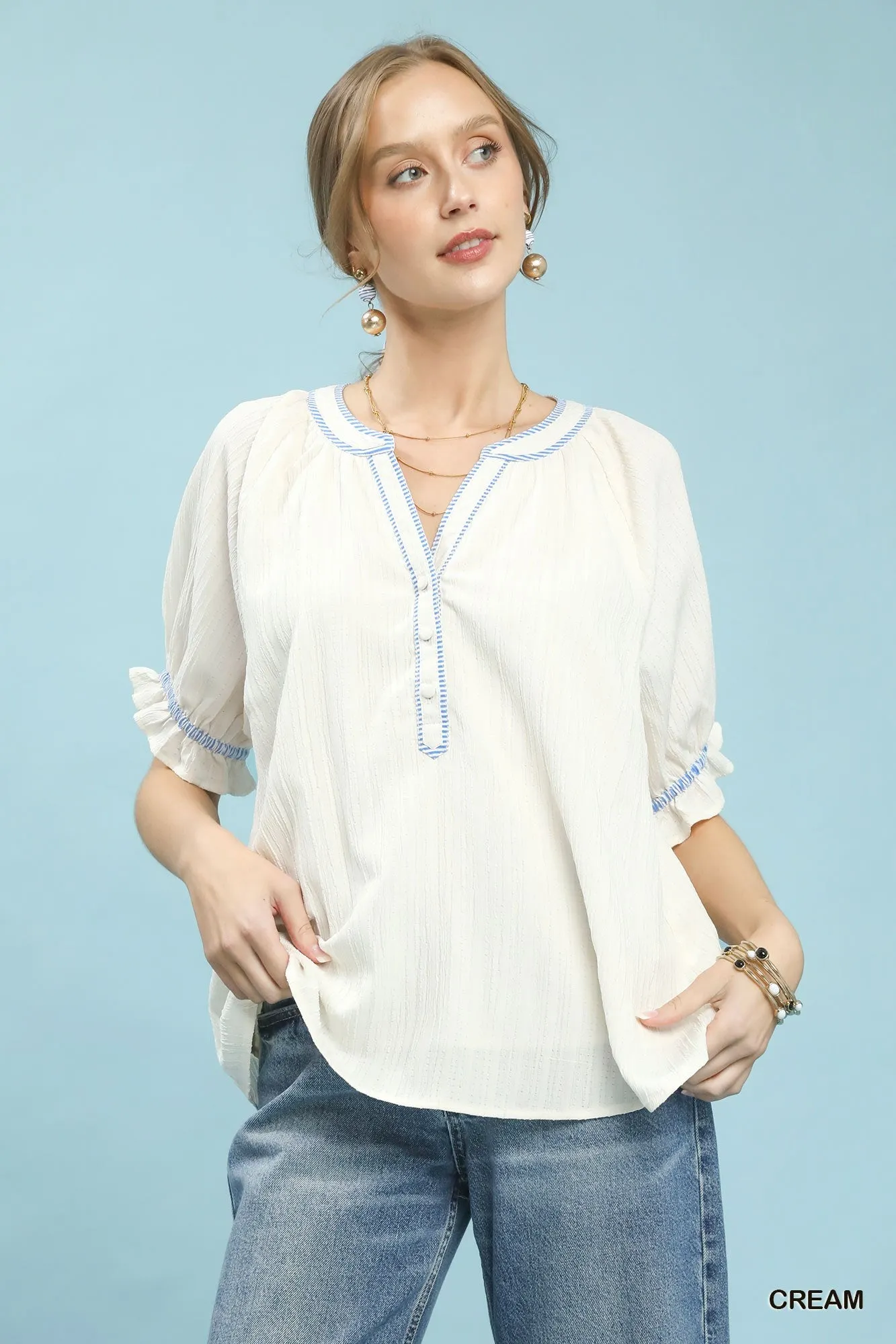 Umgee Textured Split Neck Puff Sleeve Top sold by Charming Charlie