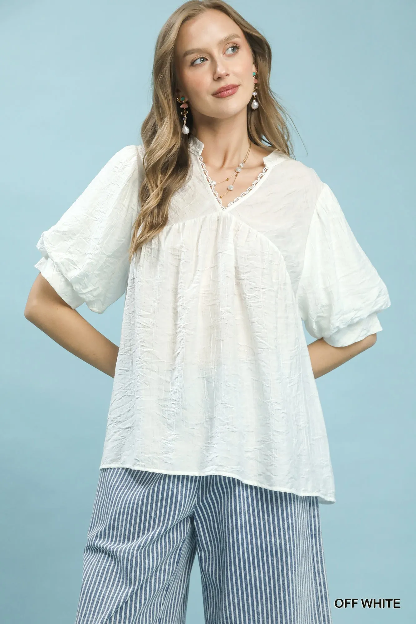 Umgee Textured Lace Trim V-Neck Boho Blouse sold by Charming Charlie