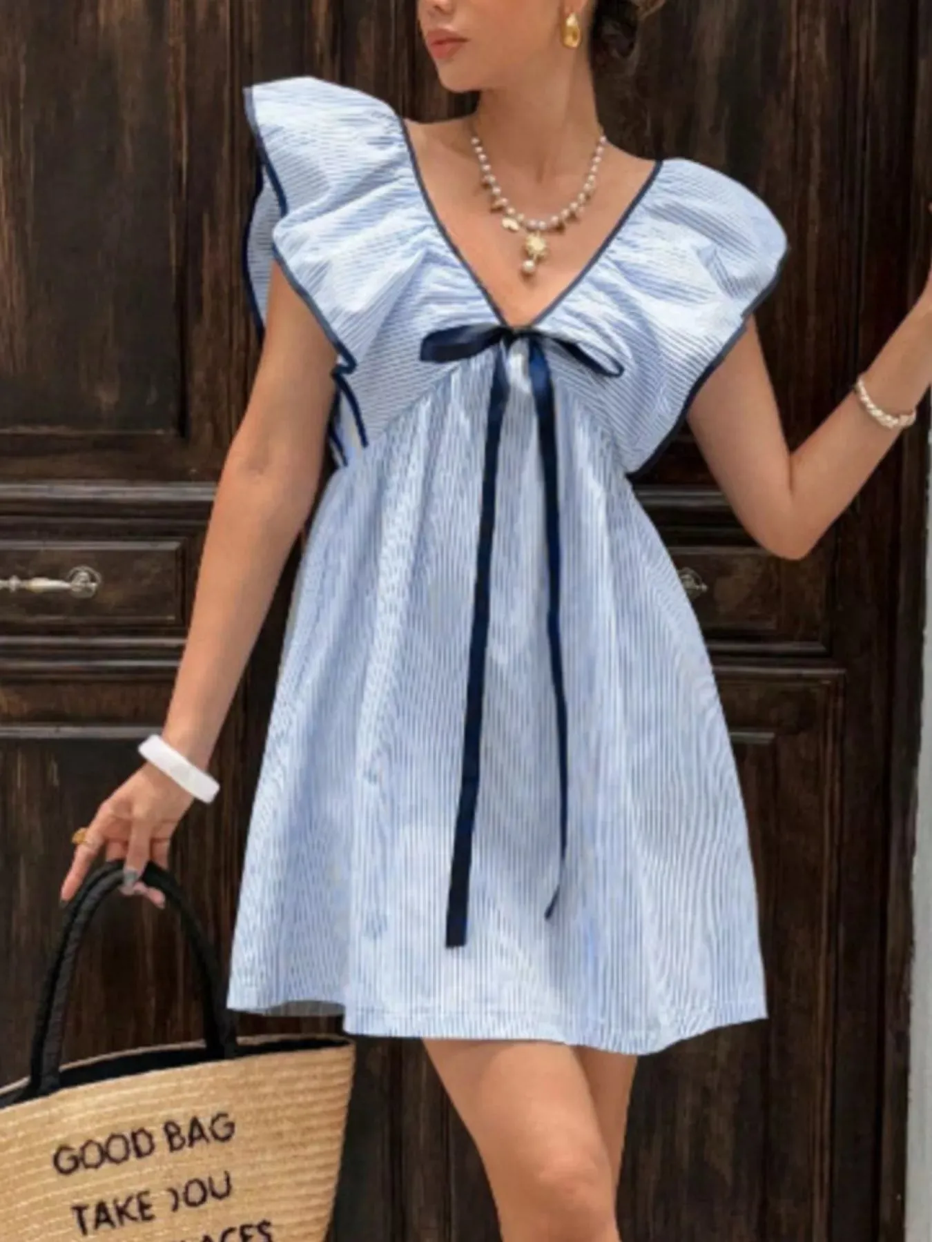 Striped Ruffle Sleeve Mini Dress sold by Charming Charlie product image thumbnail 5