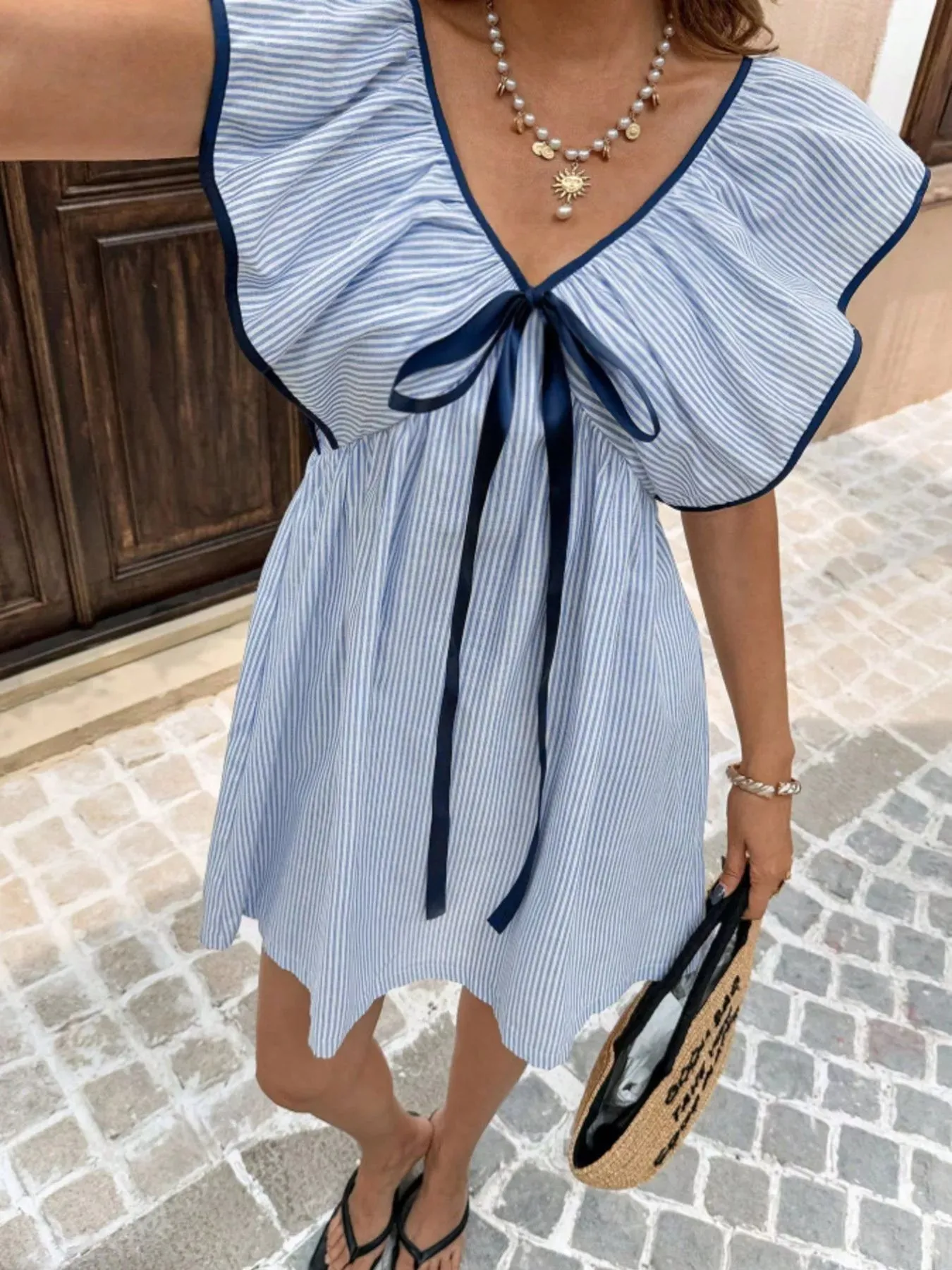Striped Ruffle Sleeve Mini Dress sold by Charming Charlie product image thumbnail 2