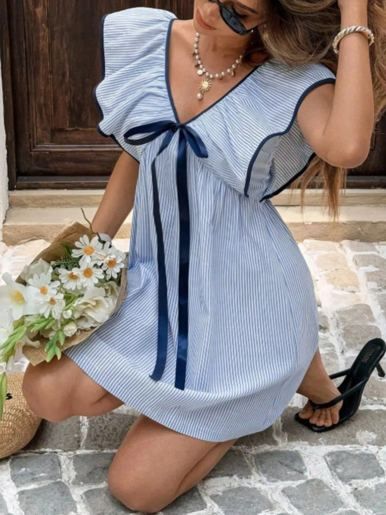 Striped Ruffle Sleeve Mini Dress sold by Charming Charlie product image thumbnail 3
