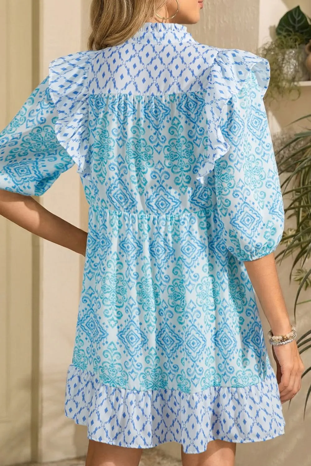 Floral Geometric Patchwork Ruffle Detail Puff Sleeve Mini Dress sold by Charming Charlie product image thumbnail 2