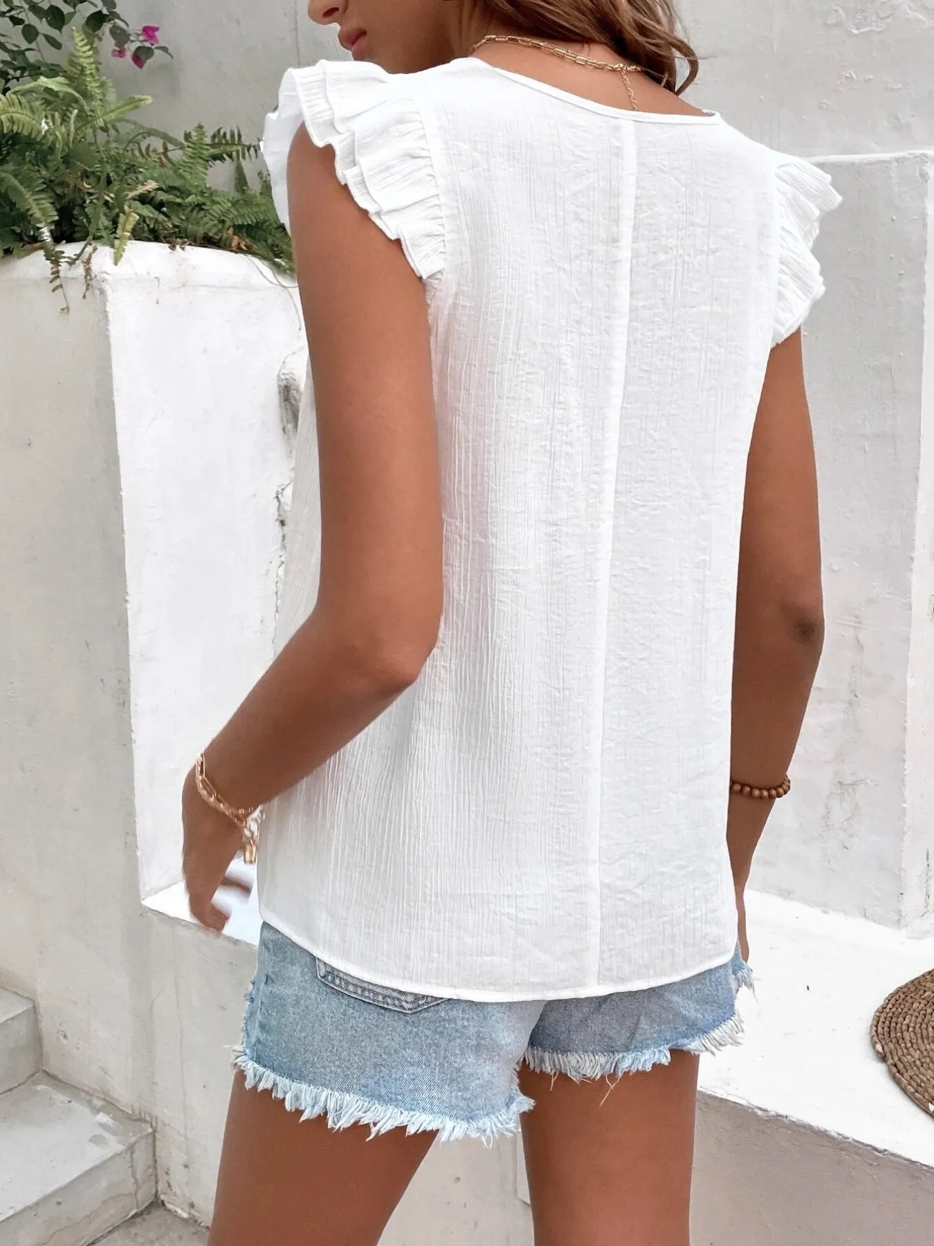 V-Neck Ruffled Cap Sleeve Blouse sold by Charming Charlie product image thumbnail 5