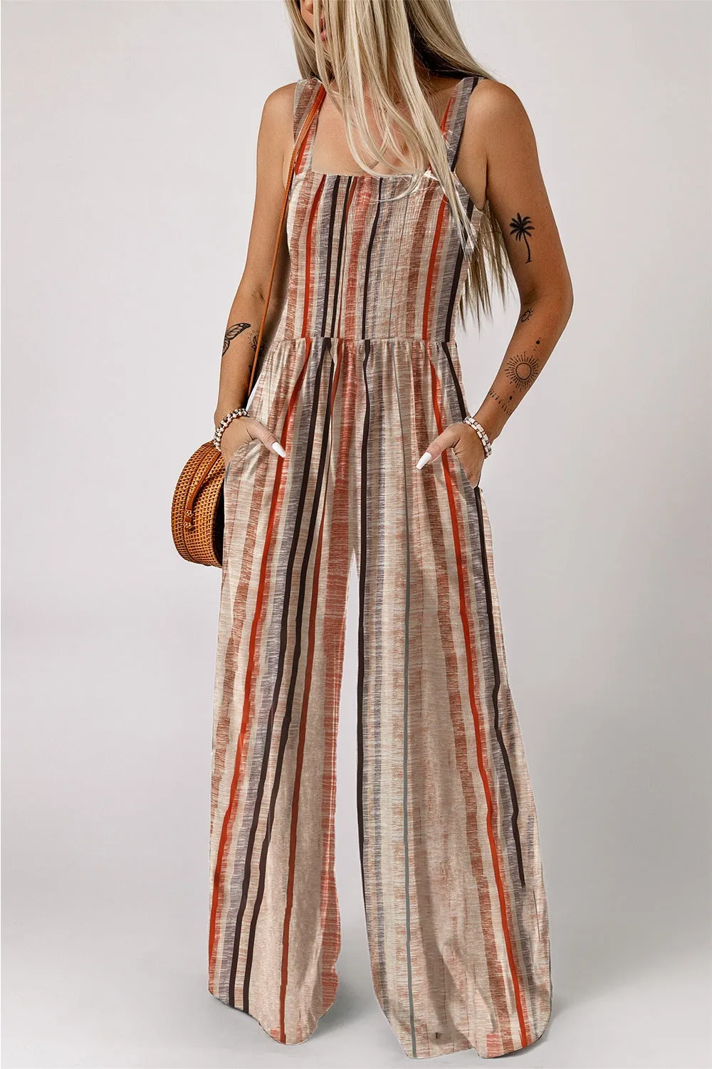 Stripe Square Neck Sleeveless Smocked Bodice Wide Leg Jumpsuit sold by Charming Charlie