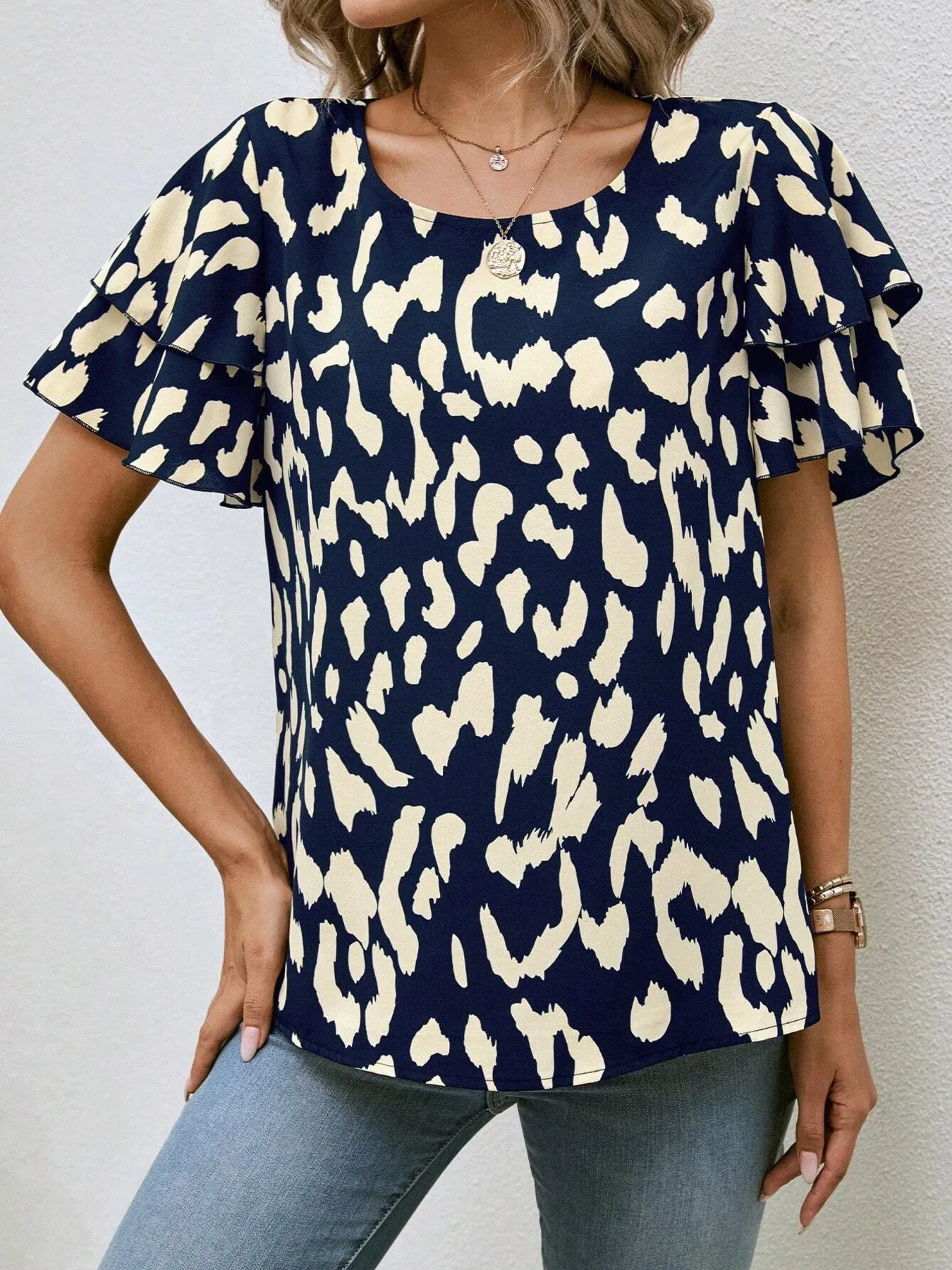 Animal Print Ruffle Sleeve Blouse sold by Charming Charlie product image thumbnail 4