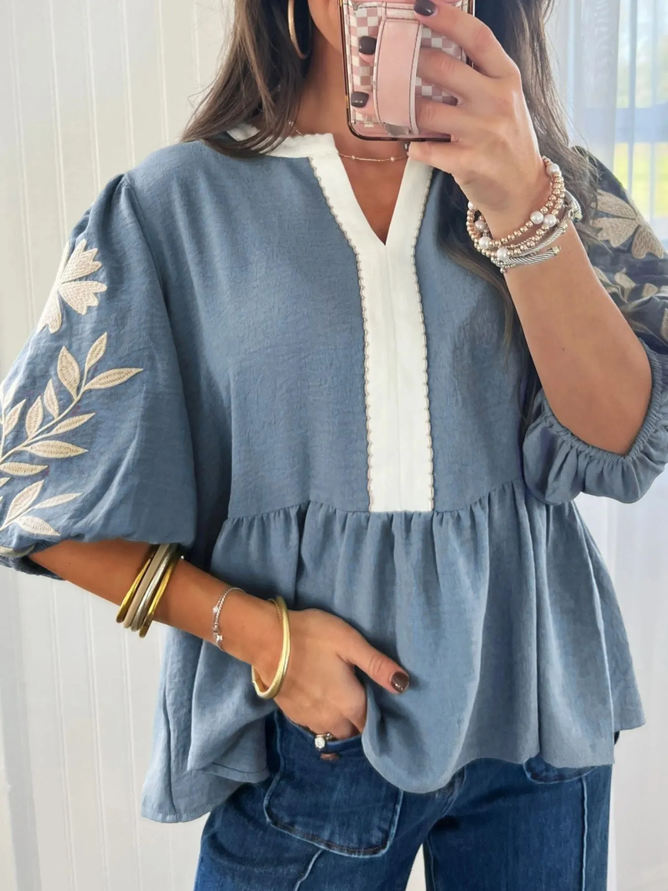 Embroidered Sleeve Peplum Blouse sold by Charming Charlie