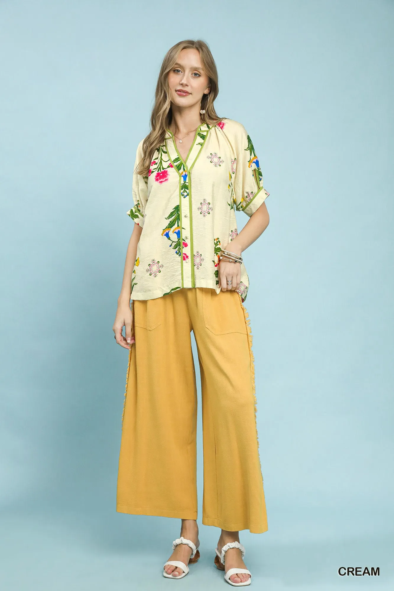 Umgee Botanical Print Contrast Trim Button Blouse sold by Charming Charlie product image thumbnail 5