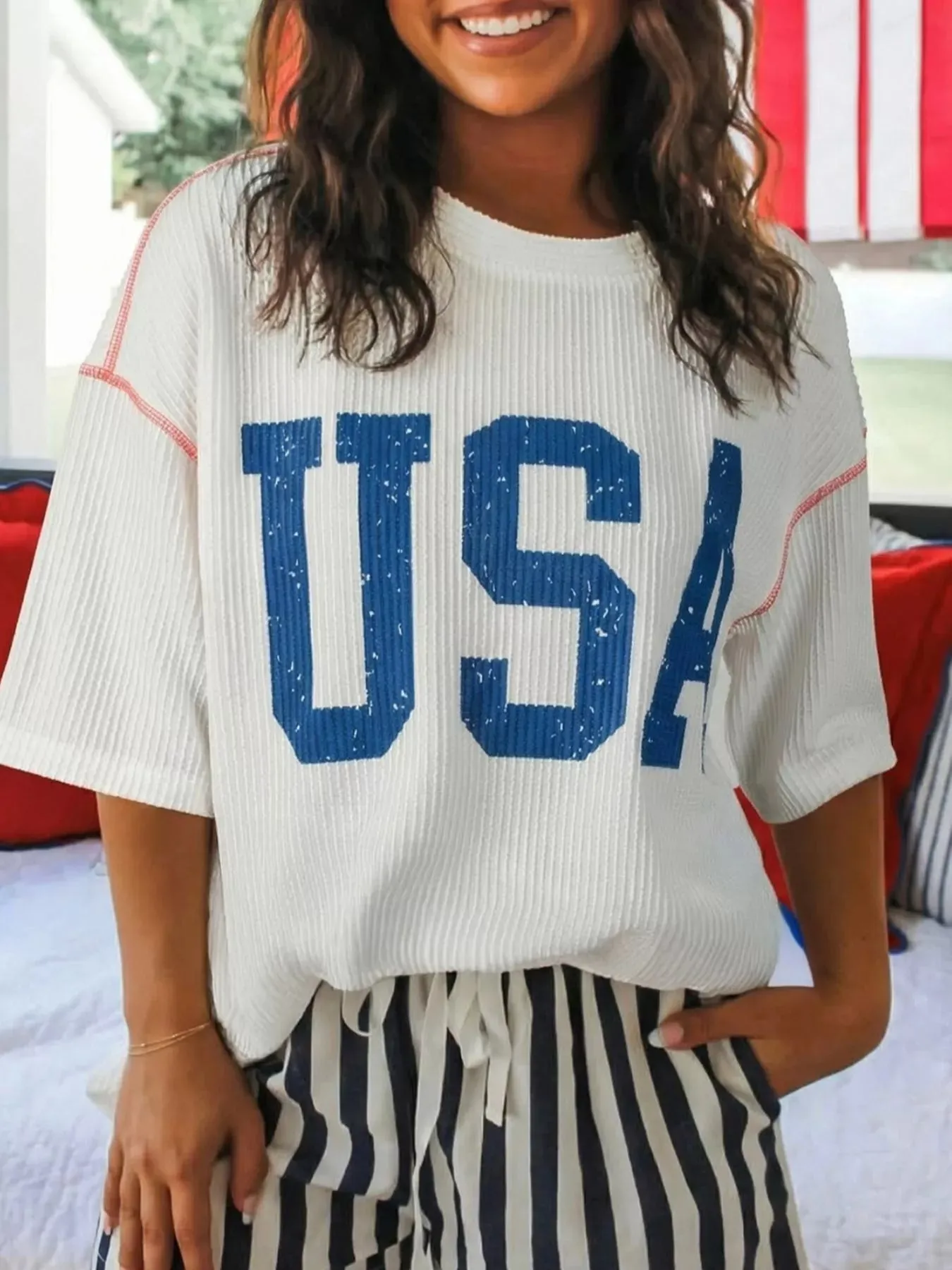 USA Graphic Half Sleeve Loose Ribbed Top sold by Charming Charlie