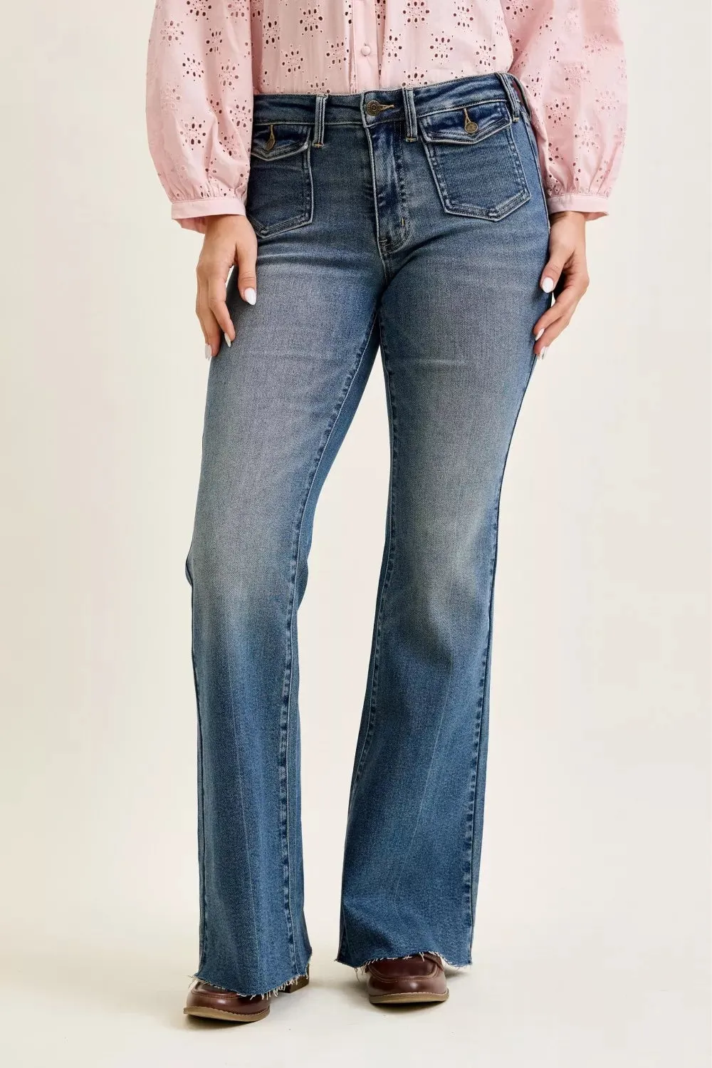 Judy Blue Mid Rise Flare Jeans with Front Flap Pockets sold by Charming Charlie
