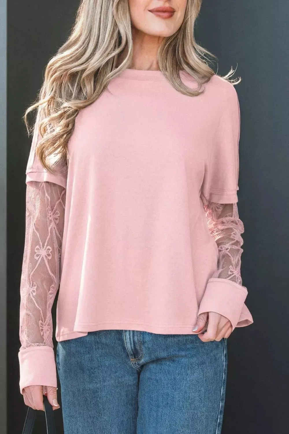 Solid Color Bow Textured Patchwork Long Sleeve Tee sold by Charming Charlie
