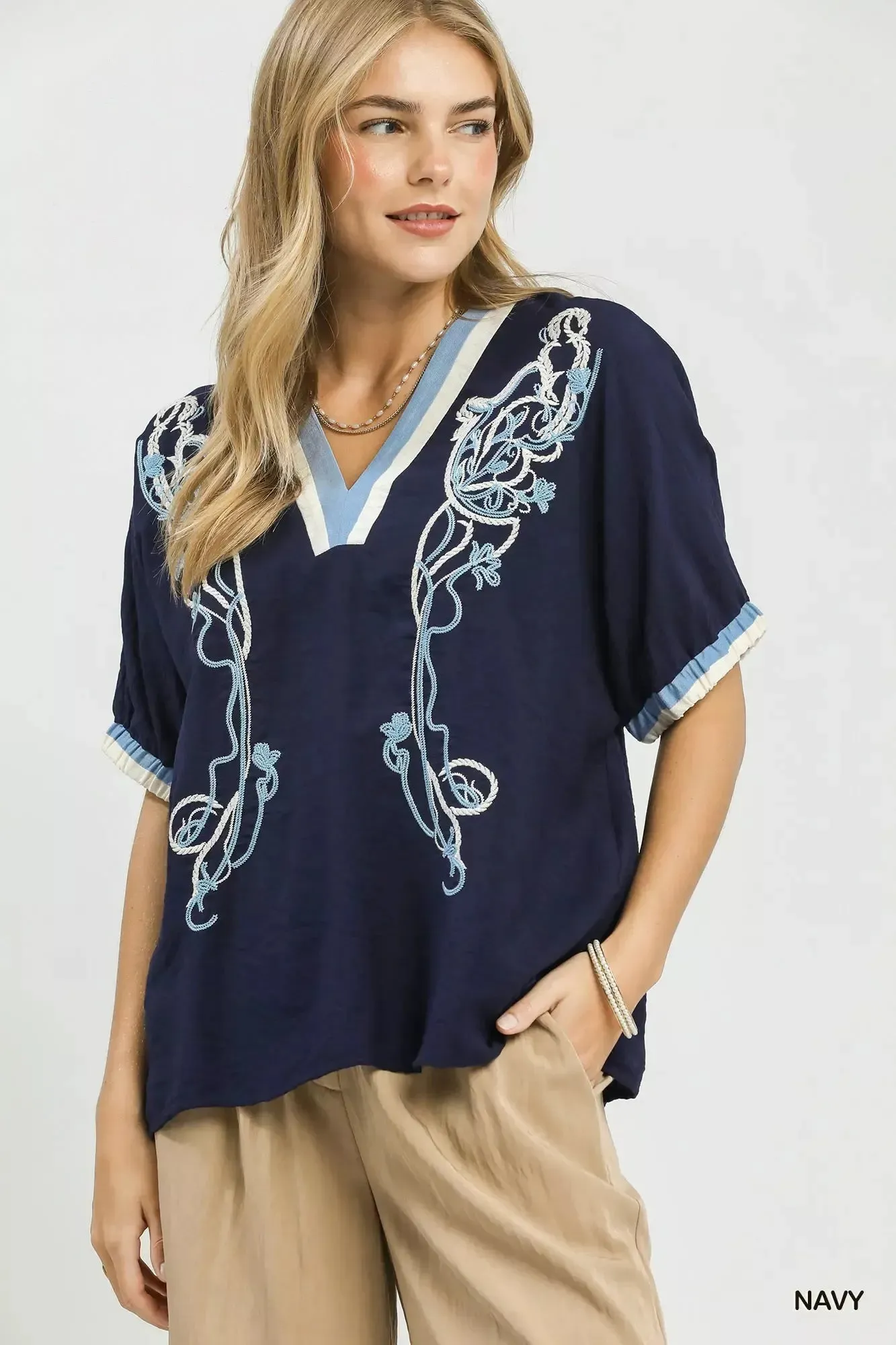 Umgee Embroidered Floral V-Neck Short Sleeve Blouse with Contrast Trim sold by Charming Charlie