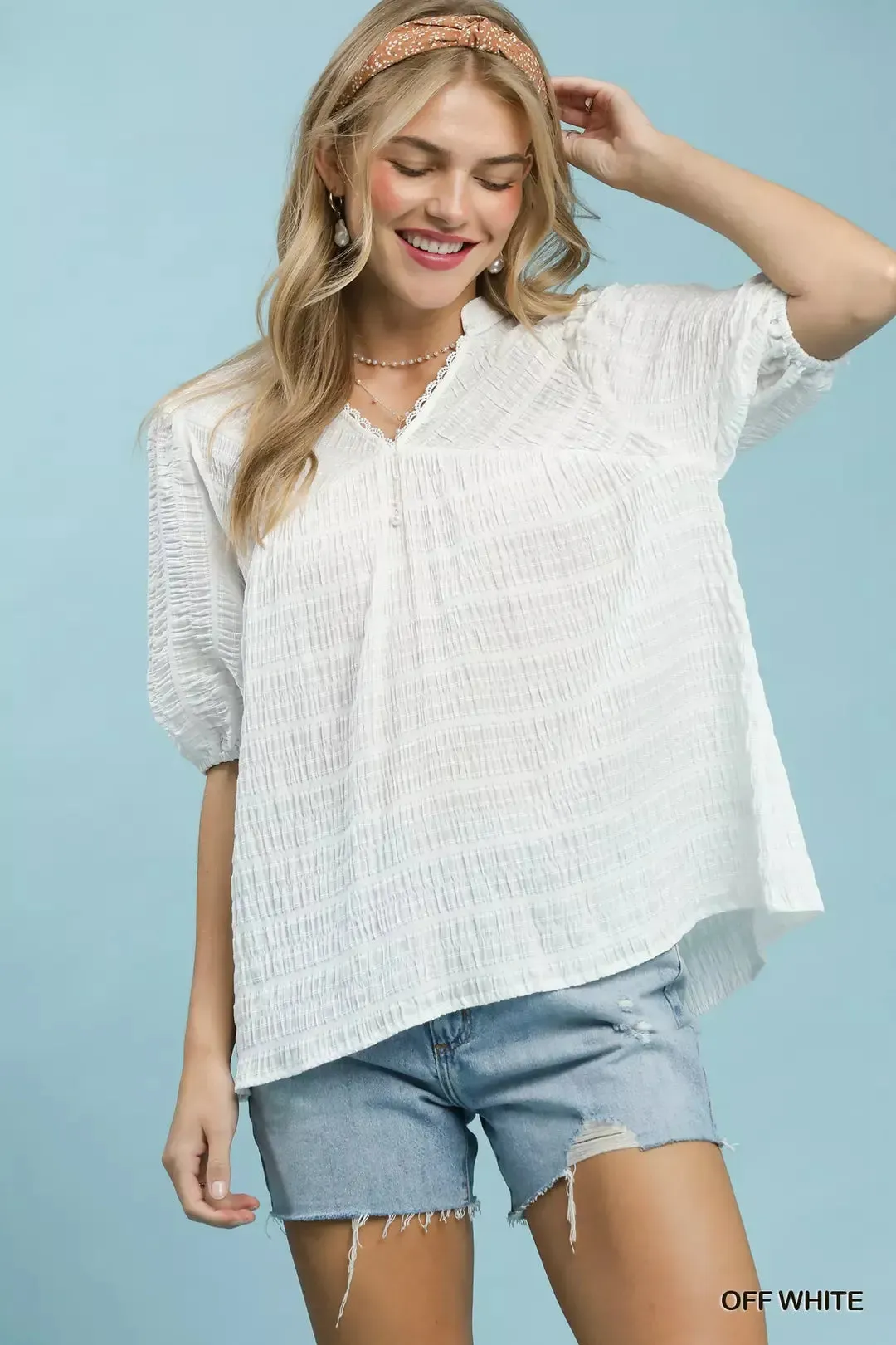 Umgee Textured Puff Sleeve Blouse sold by Charming Charlie